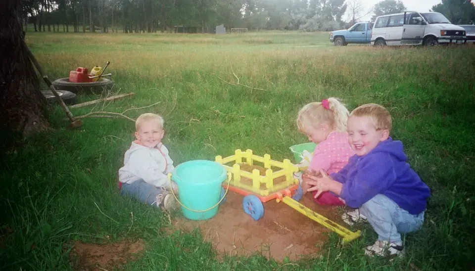 Playing in the garden · 1998